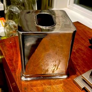 Pottery Barn metal tissue box cover. Scratches in the picture are on the table